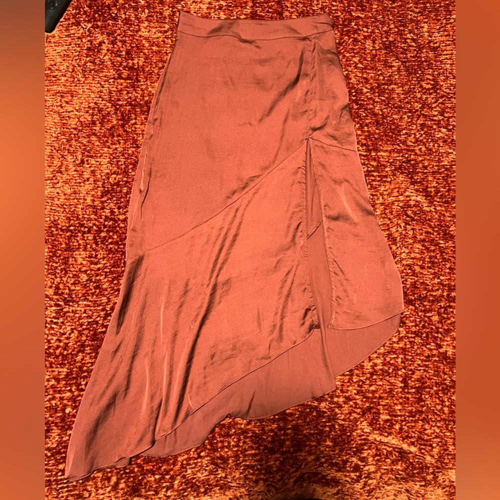 Silk Free People midi skirt in burnt orange. Lightly used, in perfect condition.